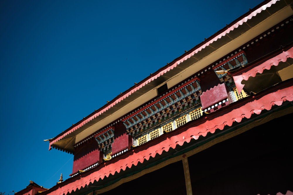 Sloping roofs of Enchey with ornate woodwork windows.(Picture Credits: Abhishek Anil)