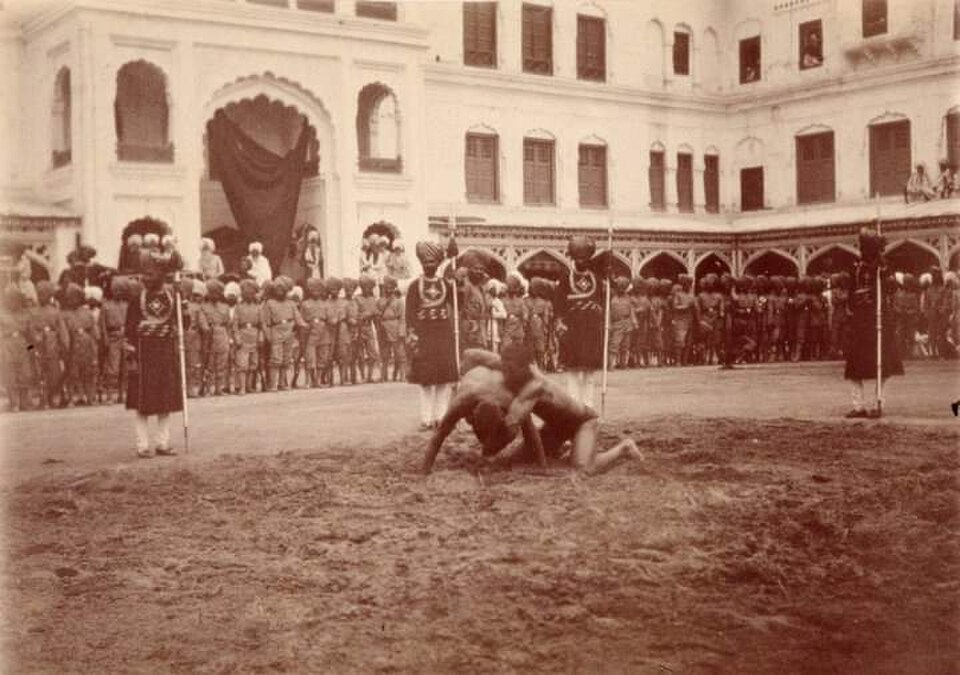 Photograph of a wrestling bout held in the court of Maharaja Bhupinder Singh of Patiala state, ca. 1903. The Maharaja used to sponsor an annual wrestling competition during the month of Muharram. (Picture Courtesy: Wikimedia Commons)
