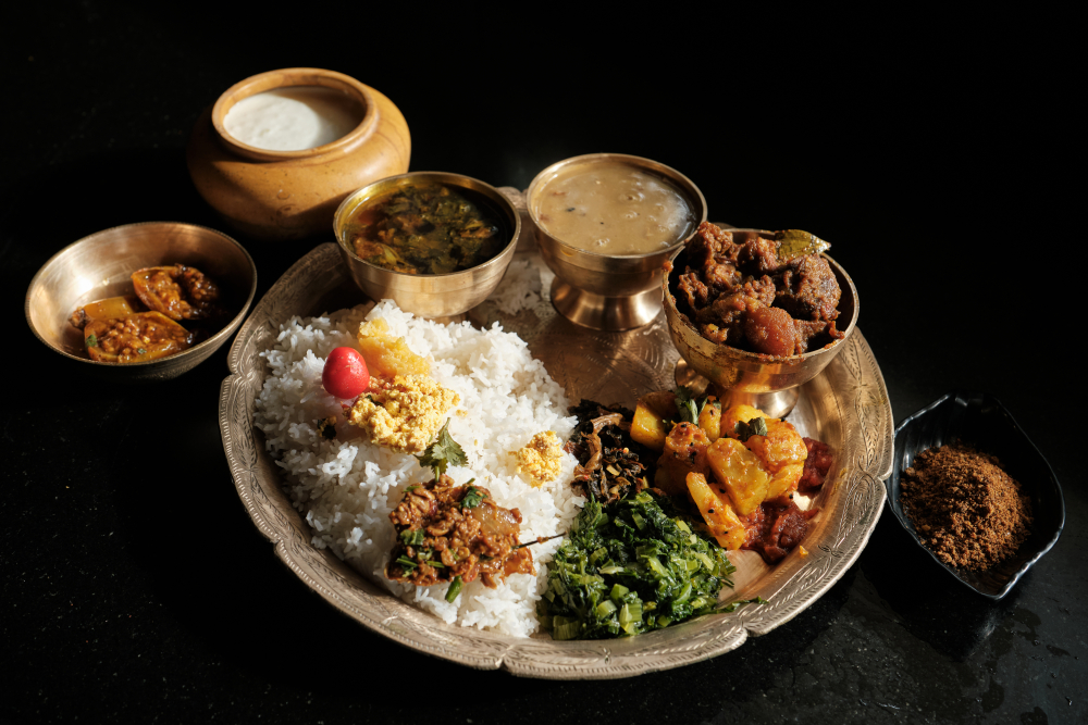 A thali with rice, lentil, vegetables and meat. (Picture Credits: Abhishek Anil)
