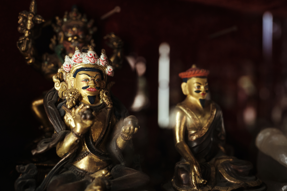 Brass sculptures of Guru Padmasambhava and other buddhist sculptures displayed inside Babu Kazi Sakya shop. (Picture Credits: Abhishek Anil)