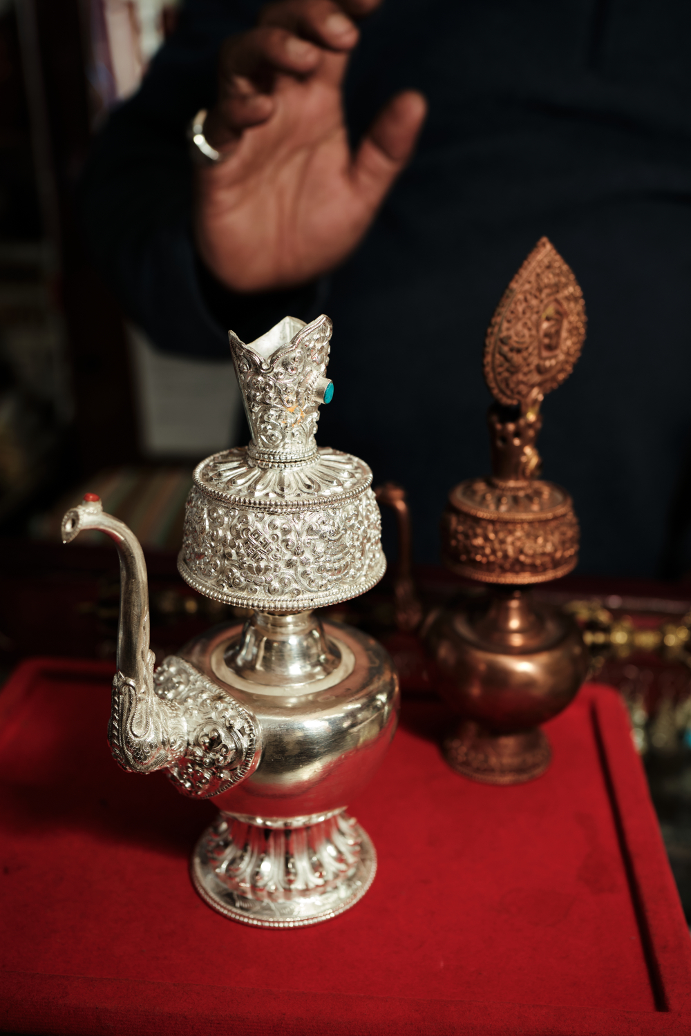 Dhananjay Sakya shows us a variation of the 'karuwa' in silver with gem inlays. (Picture Credits: Abhishek Anil)
