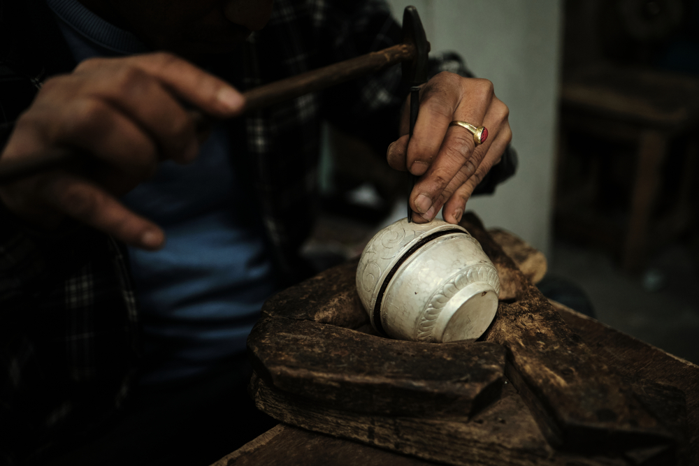 Hammer engraving on a silver bowl. (Picture Credits: Abhishek Anil)