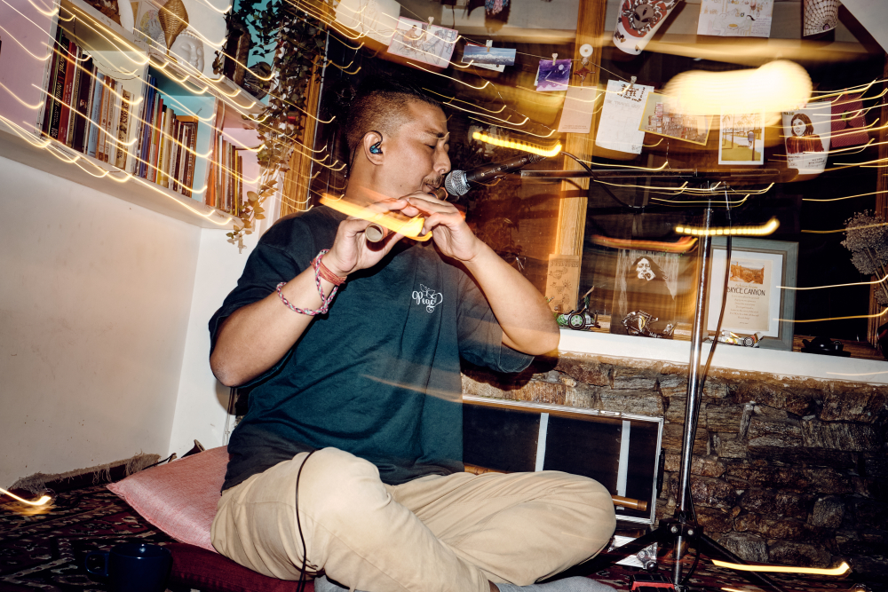 Flute artist Ashish performs at Travel Café. (Picture Credits: Abhishek Anil)