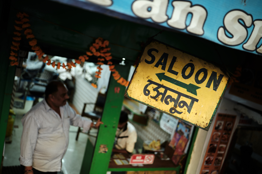 A sign board in English and Bengali in Gangtok. (Picture Credits: Abhishek Anil)