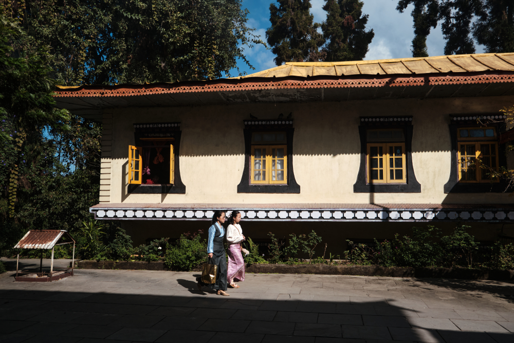 A wing of Enchey gompa with slopping roof and timber work on windows. (Picture Credits: Abhishek Anil)