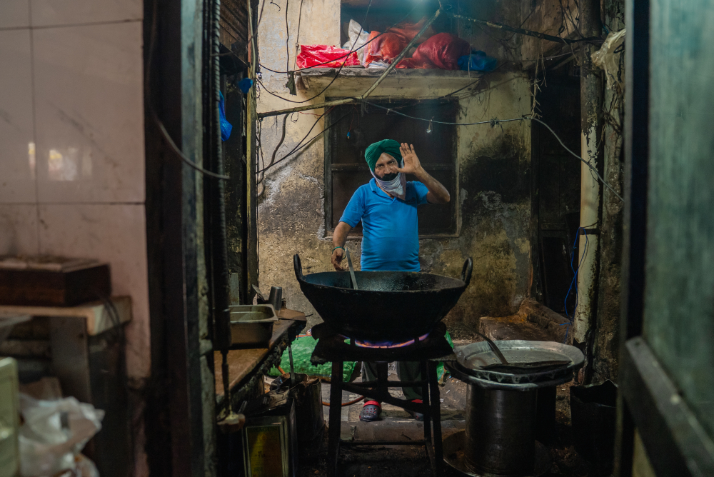 Local halwai starting the work. (Picture Credits: Meenal Upreti)