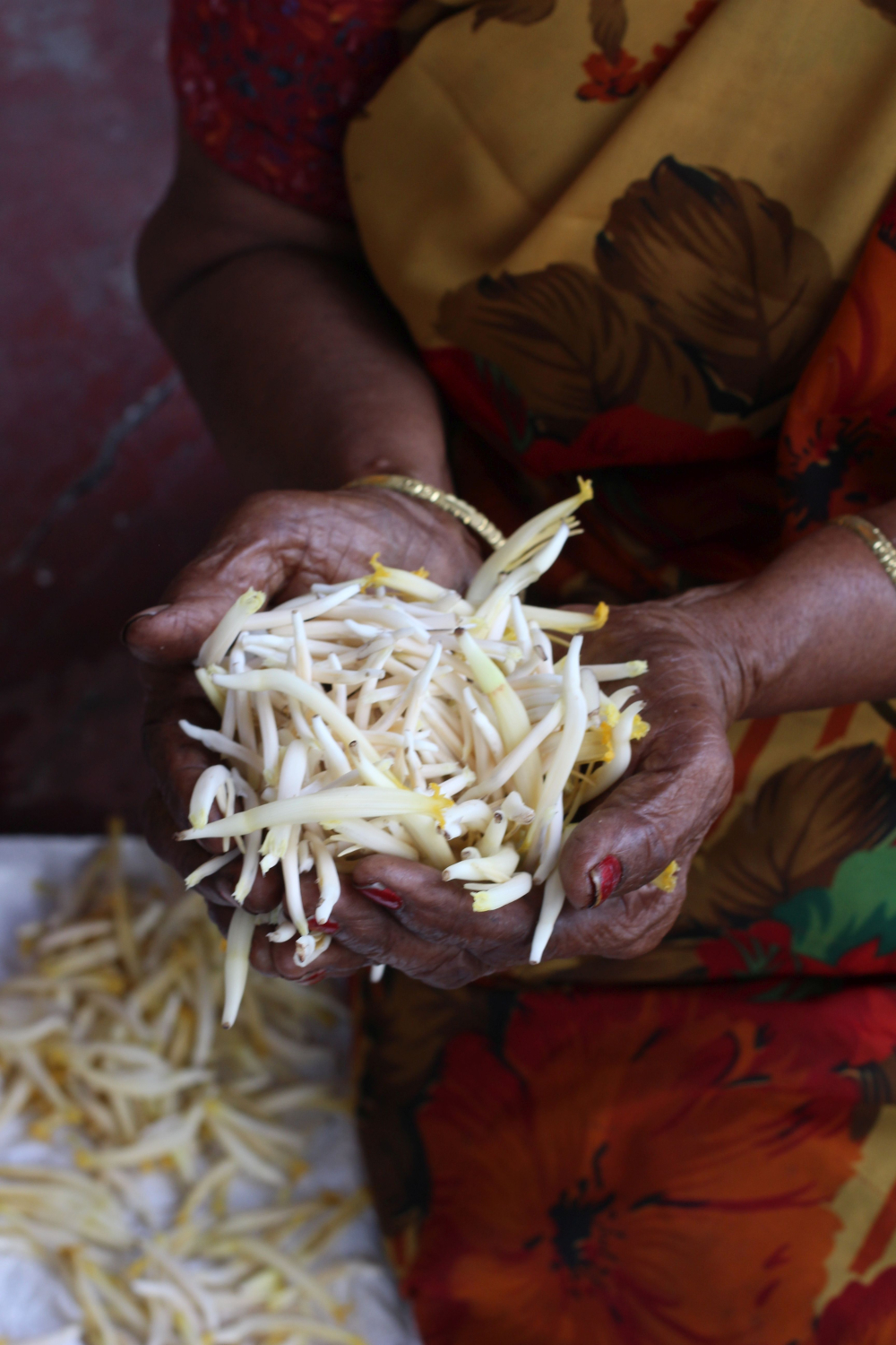 Banana flowers, their thick “kallan” (“thief”) stamens removed, prepped by a roadside vendor and made ready for quick kitchen use. (Picture Credits: Deepa Reddy)