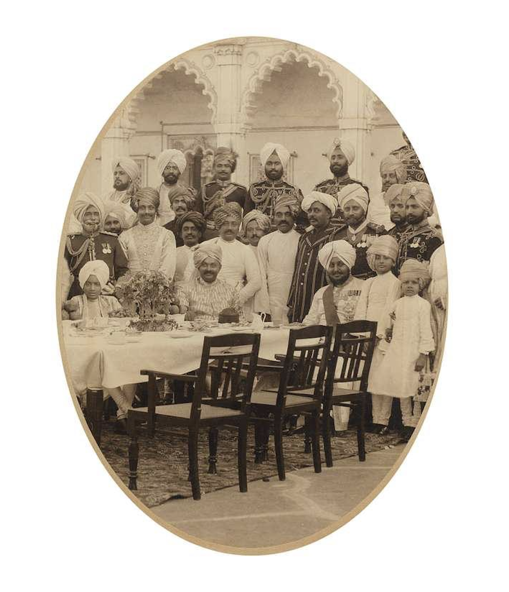 A group photograph of Maharaja Bhupinder Singh with the cricketer Ranjitsinhji Vibhaji Jadeja, known as Ranji, and other guests and servants. Patiala, ca. 1910. (Picture Courtesy: Wikimedia Commons)
