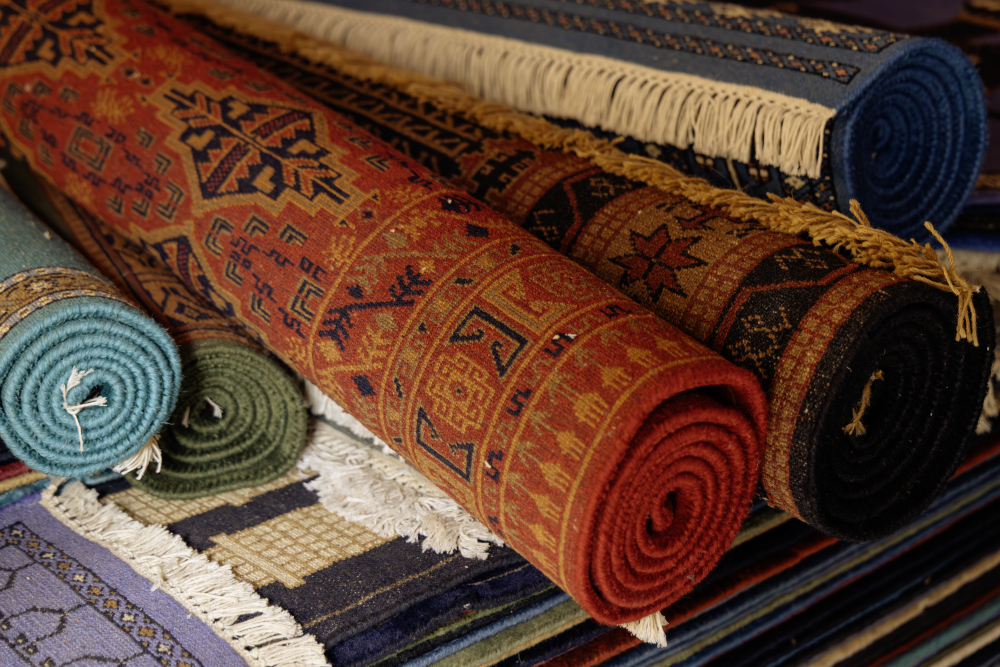 Rolled-up Gwalior carpets in the workshop of Amma Carpets. (Picture Credits: Pranjal Jain)