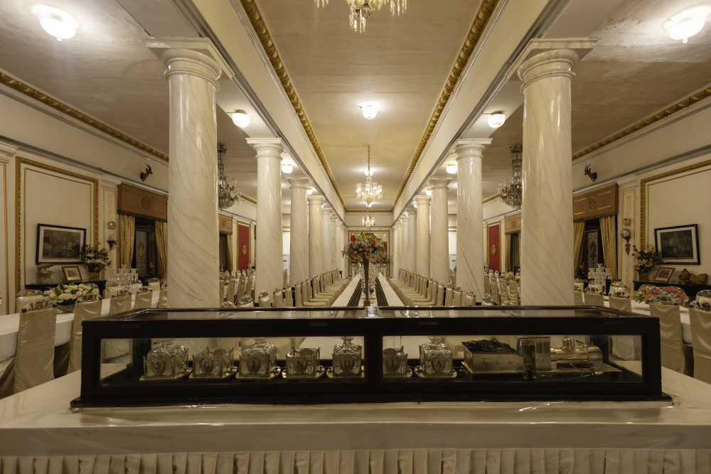 Dining Hall in Jai Vilas Palace. The Toy Train in the foreground was used for serving the dining guests. (Picture Credits: Pranjal Jain)