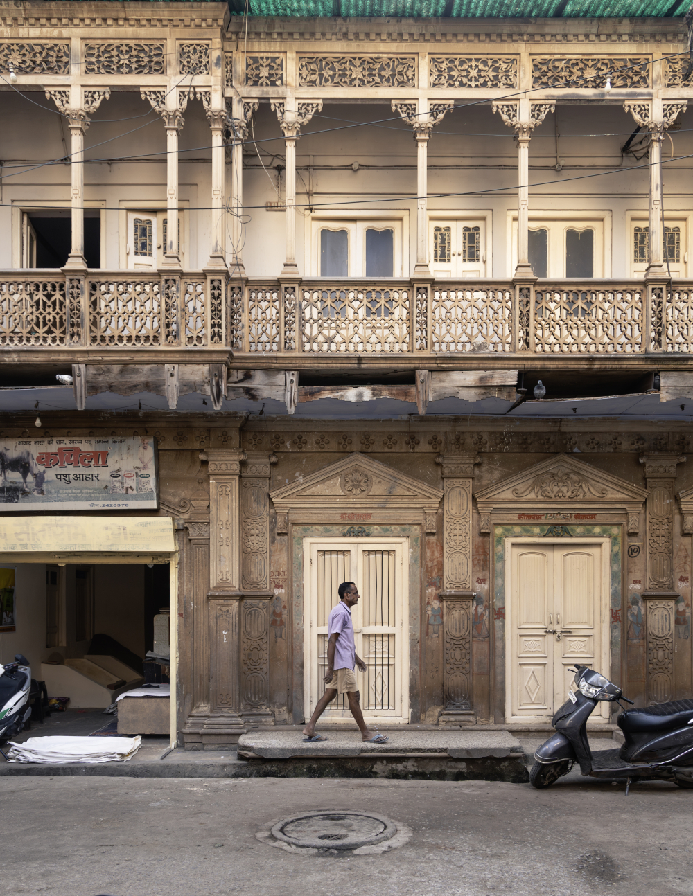 An old house with triangle-pediments, colonnades and a shop. (Picture Credits: Pranjal Jain)