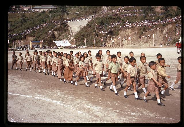 School children line up for Birthday parade for Chogyal of Sikkim. (Picture Courtesy: Alice Kandell/Library of Congress)