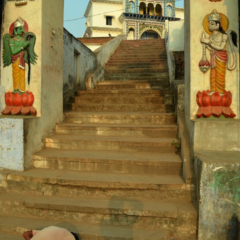 A devotee at the steps of a temple in Chitrakoot