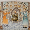 A papier mache box depicting a scene from a Mughal court with the emperor on his throne.  He seems to be engaged in court matters, while dignitaries and servants admire him in humble submission (Courtesy: Sadaf Nazir Wani)