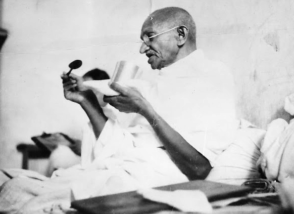 Mahatma Gandhi taking his last meal before the start of his fast in Rajkot 1939, Courtesy: Wikimedia Commons