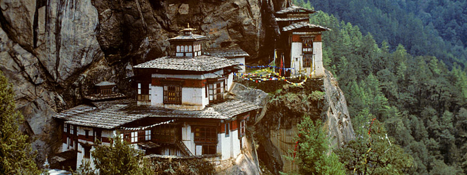 Taktseng, the Tiger’s Nest, is possibly the most widely recognised image of Bhutan throughput the world. Padmasambhava, the prince from Swat, who bestrode the Himalaya like a colossus, flew here on the back of his consort who had taken the form of a flying tigress. Padmasambhava meditated here as did many others in later years, including Milarepa. (April 1997; Canon A1, Kodachrome 64)