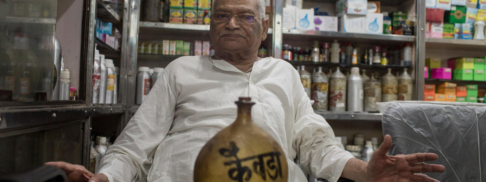 Lala Kedarnath Khatri at his perfume shop in Kannauj with a container of kewra (Pandanus) base. Due to its complexity and exactness, perfumers passed down formulas as a closely guarded secret through generations in the same family. Some families in Kannauj claim to have been in the perfume making industry for 30 generations.