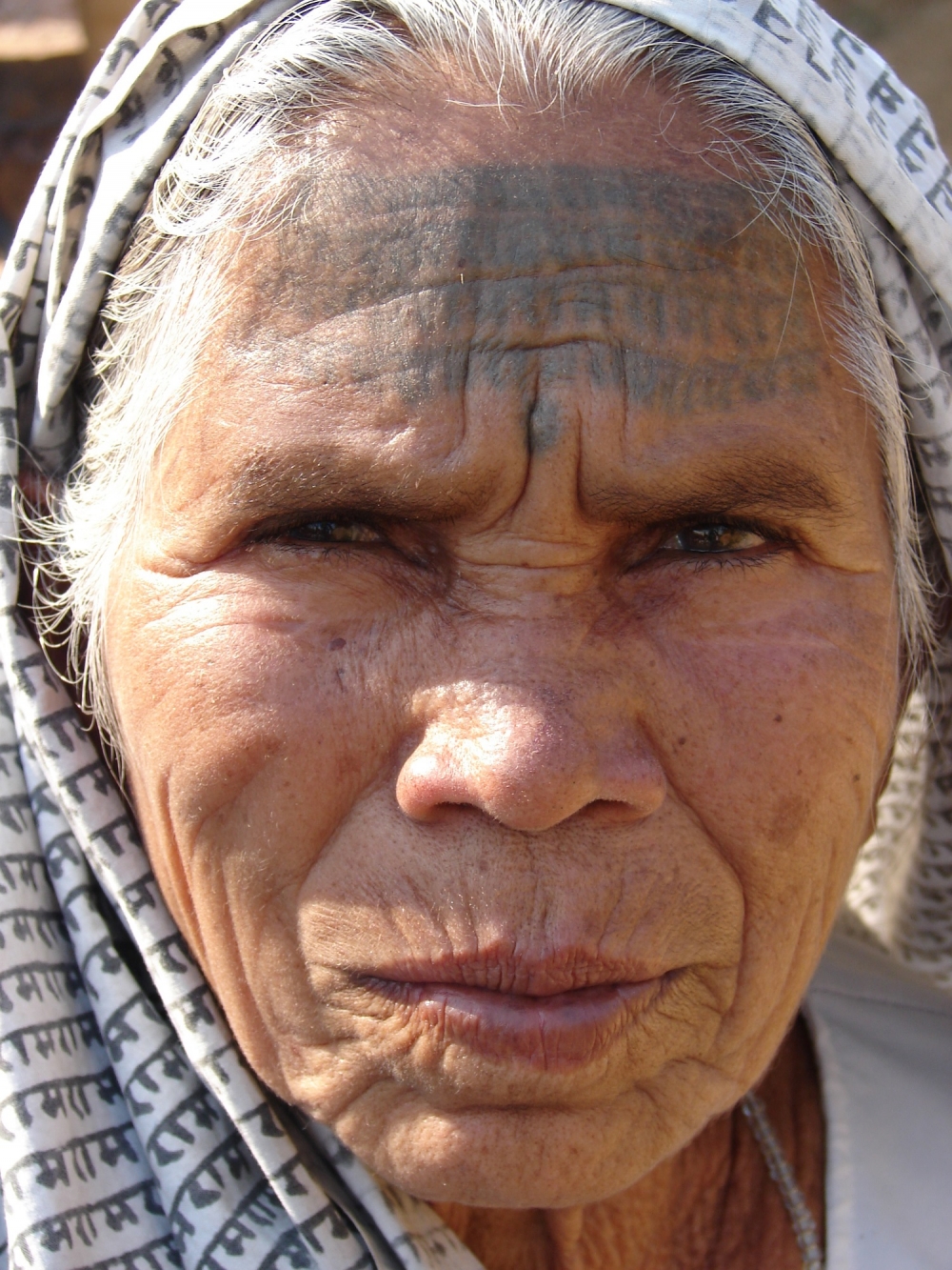 a Ramnami woman with godna on her forehead