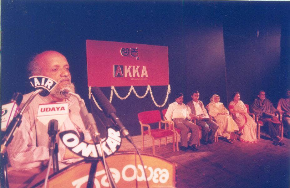 Fig. 8. The then director Prasanna speaking during the inauguration of the Akka theatre festival, the seed of the annual Bahuroopi festival. Sitting on the dais is also Rangayana’s founder BV Karanth (Courtesy: Rangayana)