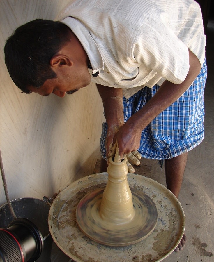 Bhikhan Ram working on electric wheel 