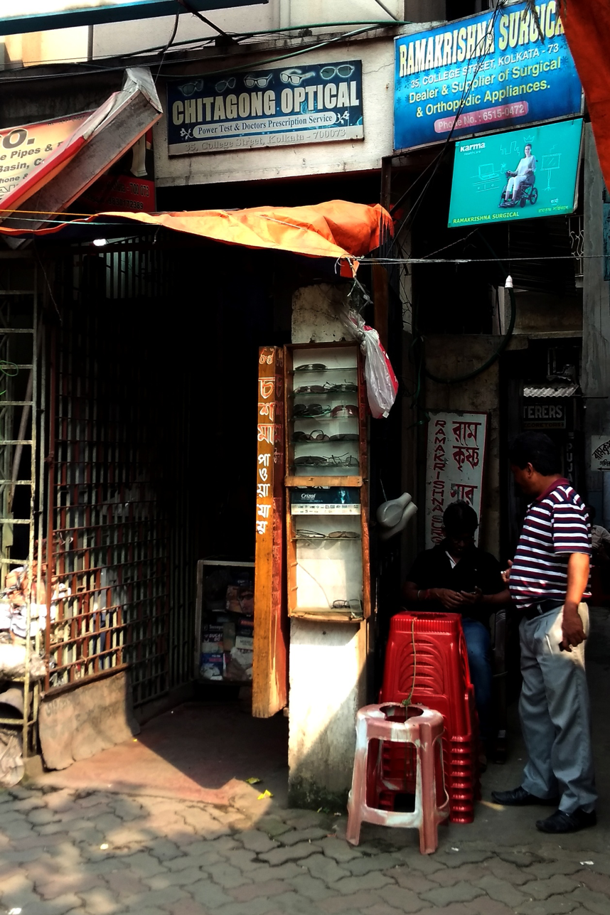 Fig. 1: College Street: Chittagong Optical. The owner says the shop was established by his father 70 years ago. Courtesy: Priyankar Dey