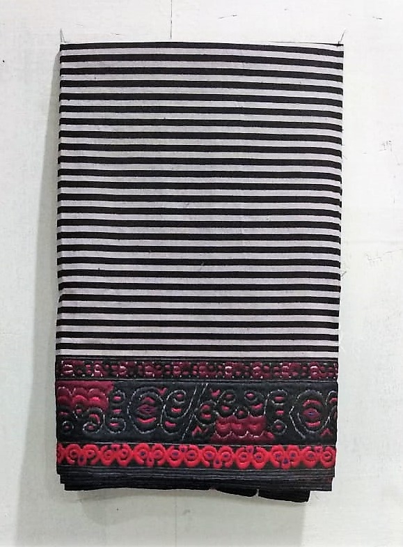 Fig 2. The hija mayek naibi is also known as lukhra phanek (widow phanek) since it was reserved for mourning. The striped design is composed of two colours, black and white, and could only be worn by women from the royal family. Such restrictions are no longer adhered to and all women wear this pattern now (Courtesy: The Heritage Foundation for Mankind Museum, Sangaiprou, Manipur)