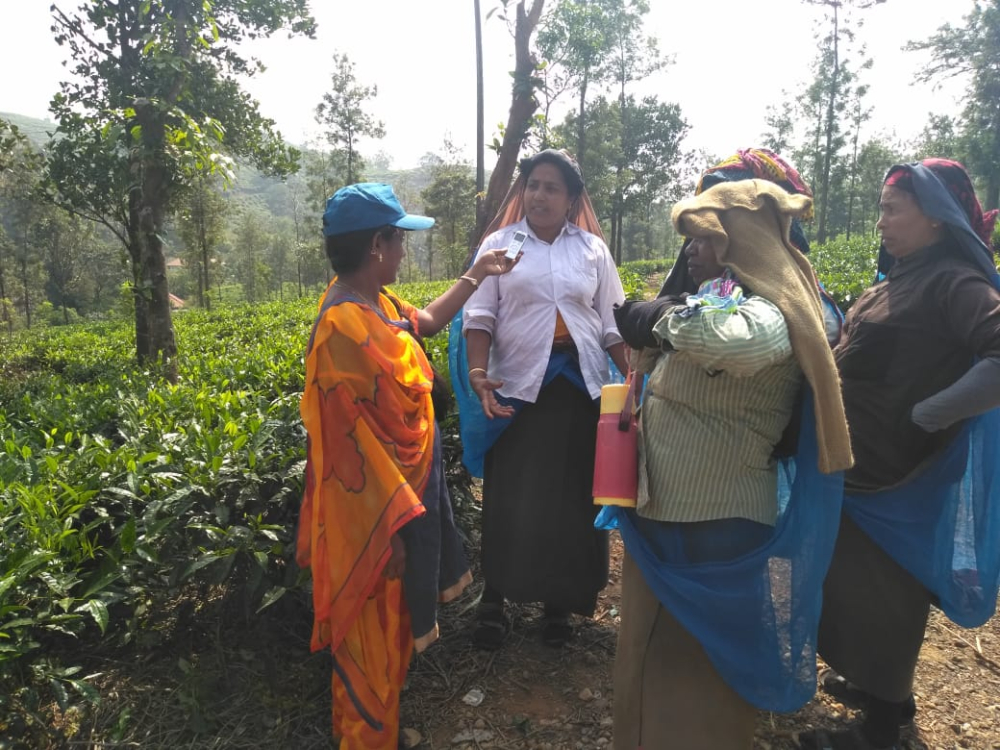 Fig 3: Jesma James, a programme producer with Radio Mattoli, records a snippet with famers from the local tea plantations for a show for Radio Mattoli. One of the key advantages of community radio is that it does not require people to come into the studio necessarily for them to record content. Often producers and reporters from community radio stations go out into local communities to gather and record material for broadcast, which allows for more people to have access to the medium to share their voice (Courtesy: Radio Mattoli)