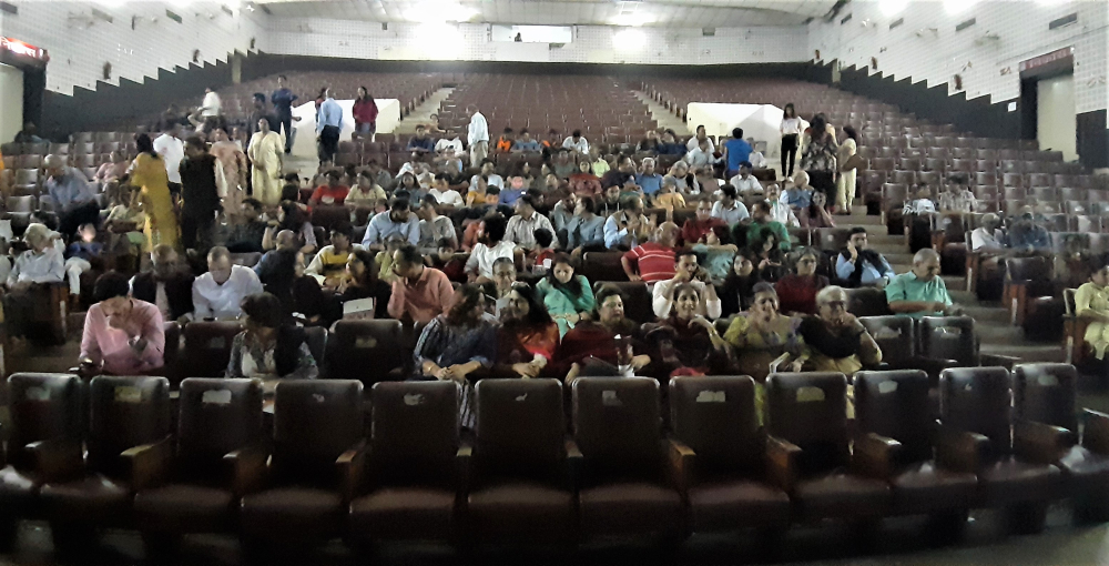 Fig 5: A picture from the 2019 Ranglok Theatre Festival. This was the third edition of the multi-day theatre extravaganza in which four plays were performed. This picture shows the audiences filling up the seats before the play is about to begin.