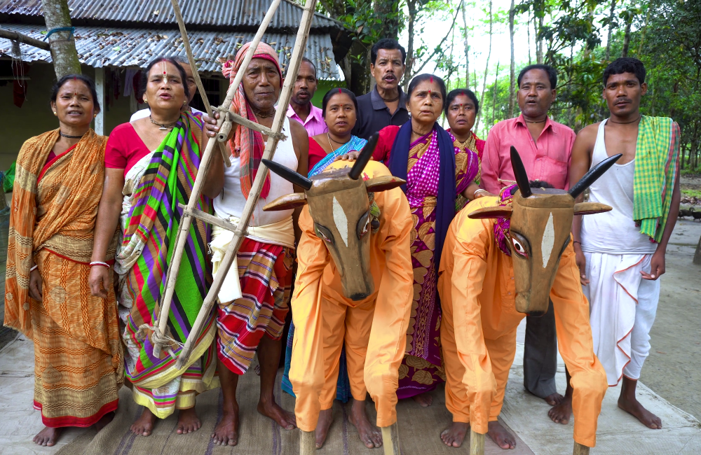 Fig. 5: The entire Khon group of Mohisbathan Naarikolyan Samiti with props such as plough and cattle mask to add a realistic tinge to the tragic life of a rural household. The group is women led and is founded by Akulbala Sarkar, the first woman khon performer Fig. 3: Shreyosee Sen interviewing Akulbala Sarkar 