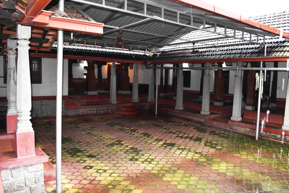 Fig. 3: Renovated chowka of Nalikedabettu Guttu, Nitte. Traditionally, chowkas used to be unroofed and had only stone or mud flooring but modern-day guttumanes have renovated them. The open space is surrounded by corridors on all four sides 