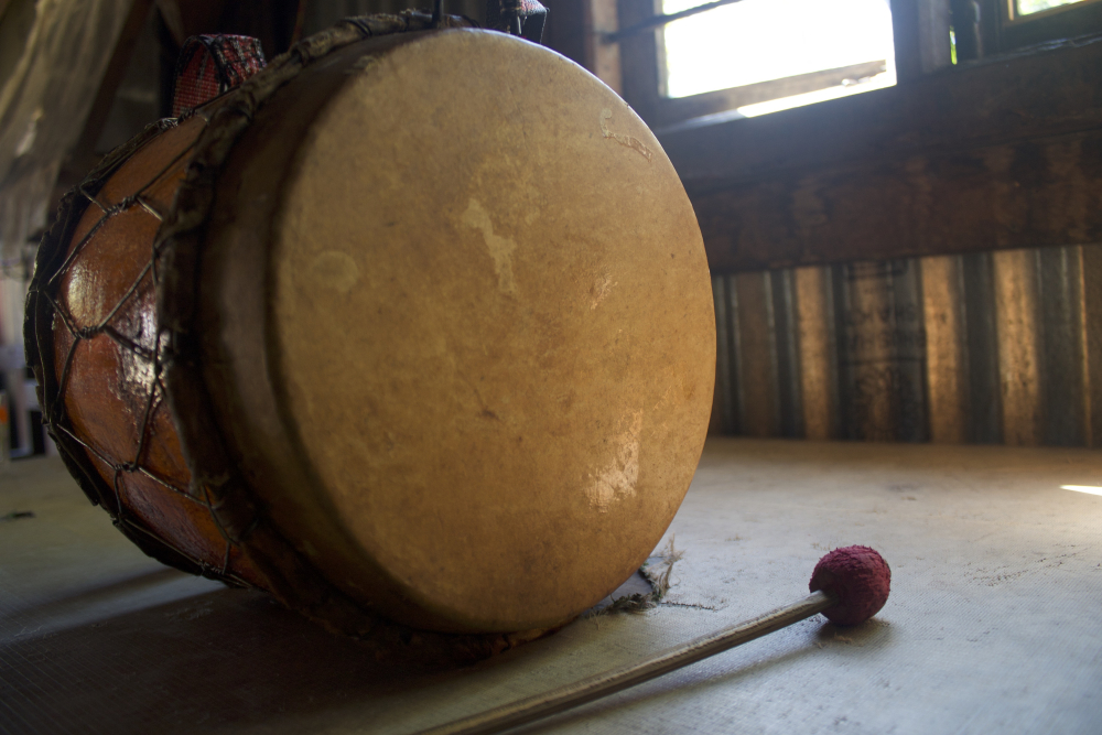 Fig. 4:  Nkhuangh viewed from the side. Nkhuangh is the main membranophone instrument of the Ruangmei people. The membrane is made from buffalo skin; the skin is dried in the sun, soaked overnight and its hair follicles are cleaned so that the membrane of the drum is smooth and provides a good echo when hit (Courtesy: R. Husuang)