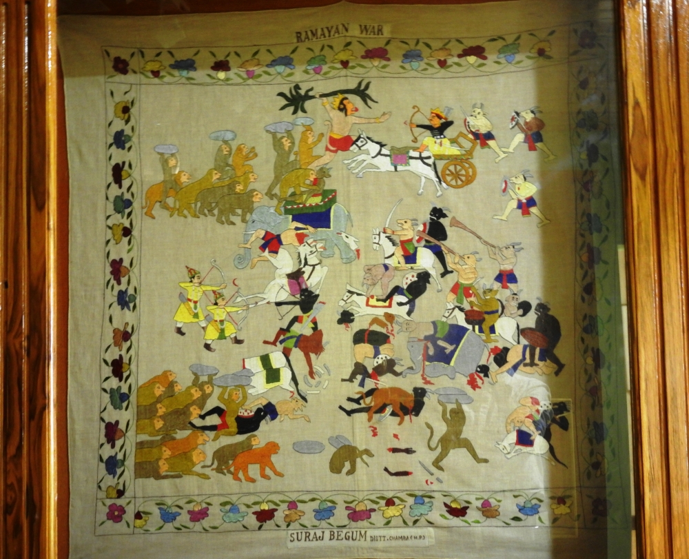 Fig. 3: Ramayana War by embroidery and outlining artist Suraj Begum, made on muslin, Himachal State Museum Collection. The rumal shows vanar sena (army of monkeys) attacking Ravana’s army. The motifs of horses, elephants, chariots, bows and arrows are integral to this rumal. Red thread has been used skilfully to realistically depict blood flowing out of attacked animals and people