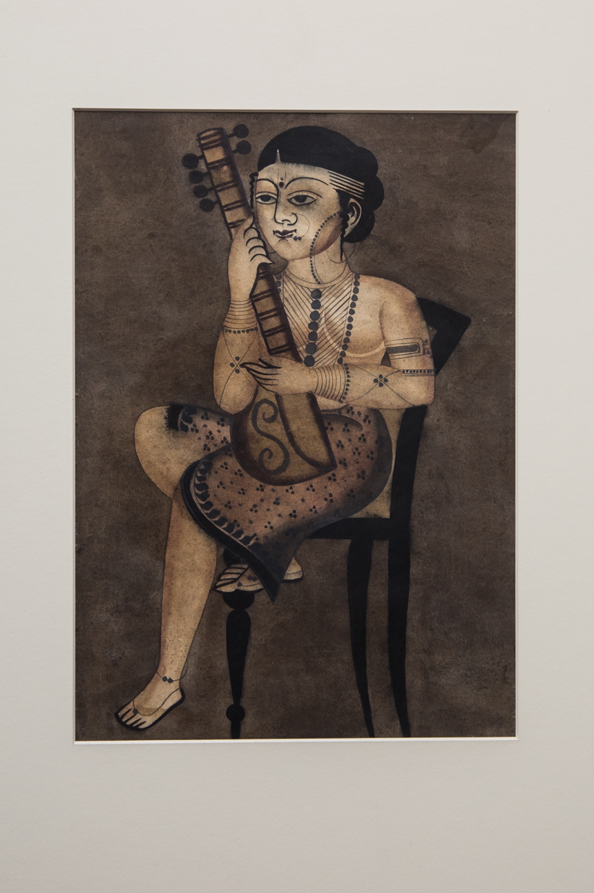 Fig 1. The Kalighat paintings were a collaborative effort by the whole family, resembling an assembly line production process. This painting shows a woman relaxing on a chair and playing the veena (Courtesy: Darshan Shah/Weavers Studio Research Centre, Kolkata)   