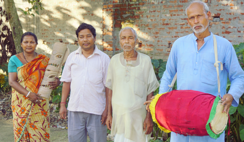 Fig. 6: Khon artist, Kamala Baishya displaying her wooden artefacts, along with the other members of her group 