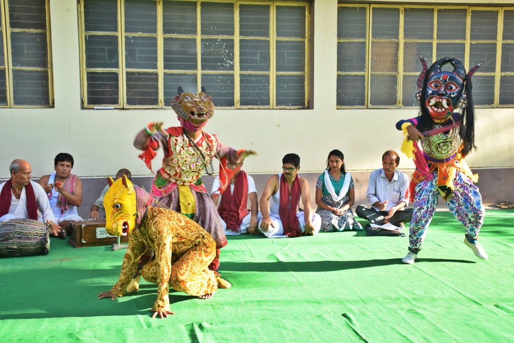 Fig. 10: Namaboli, a khon performed as a 30-minute street play with mukha (mask) dance as a part of the Dakshin Dinajpur district administration’s initiative on electoral literacy ahead of the Lok Sabha elections, 2019.