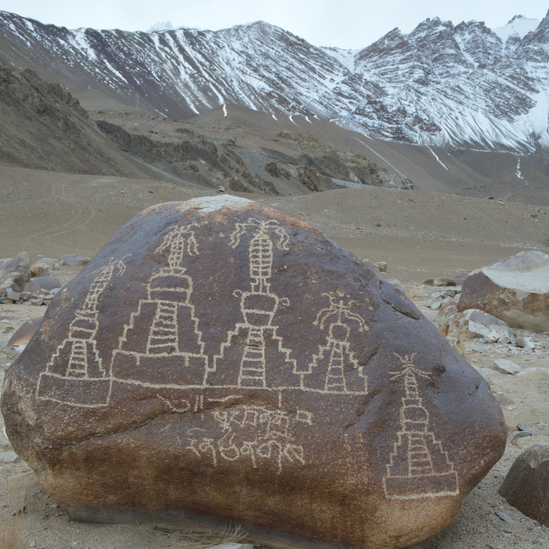 Carvings of stupas with votive inscriptions made by soldiers of the armies of King Od Lde in the 11th Century during his invasions of the Western territories of Ladakh, Baltistan  and Gilgit. The stone carving is located in Alchi (Courtesy: Tashi Ldawa)