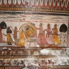 वृन्दावनलाल वर्मा के उपन्यास झाँसी की रानी में ओरछा के किले का अनेक स्थानों पर वर्णन किया गया है। प्रस्तुत चित्र में किले में स्थित राजा महल के अन्दर एक कक्ष की दीवारों और छत पर बुन्देल शैली में विष्णु और रामायण से सम्बन्धित चित्र अंकित हैं। (फोटो: अमिता चतुर्वेदी, 16 नवम्बर 2019)