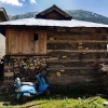 A house in the Bagori village demonstrating composite construction technique used for construction of houses. As shown in the picture, locally available materials like deodar wood and stone are used. In some houses, the fascia is carved with either floral pattern, Tibetan scripts or names of the owners along with the year of construction (Courtesy: Sweta Kandari)