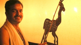 Rajeev Pulavar with a Mareecha puppet